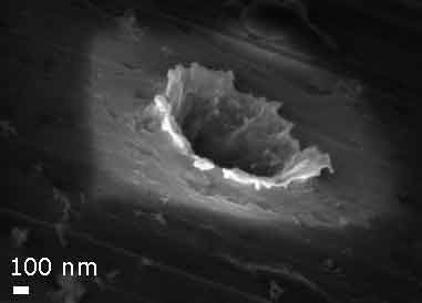Дыра, пробитая частицей кометы в аэрогеле зонда Stardust